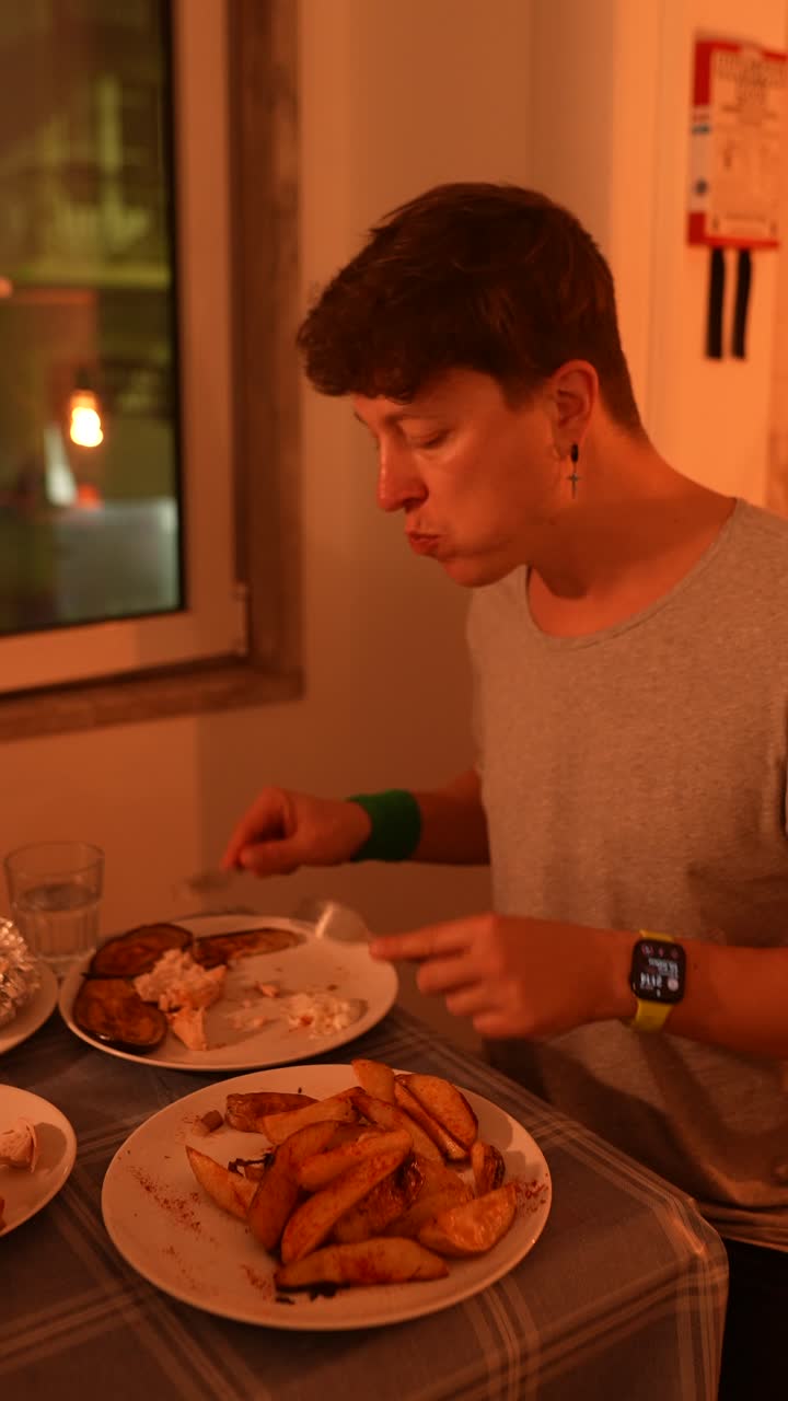 Person Eating Potatoes