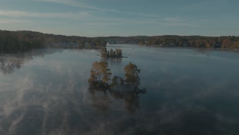 flying over islands on moosehead lake surrounded by morning mist