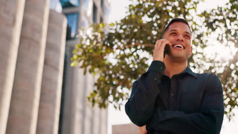 low angle, businessman or phone call in urban city