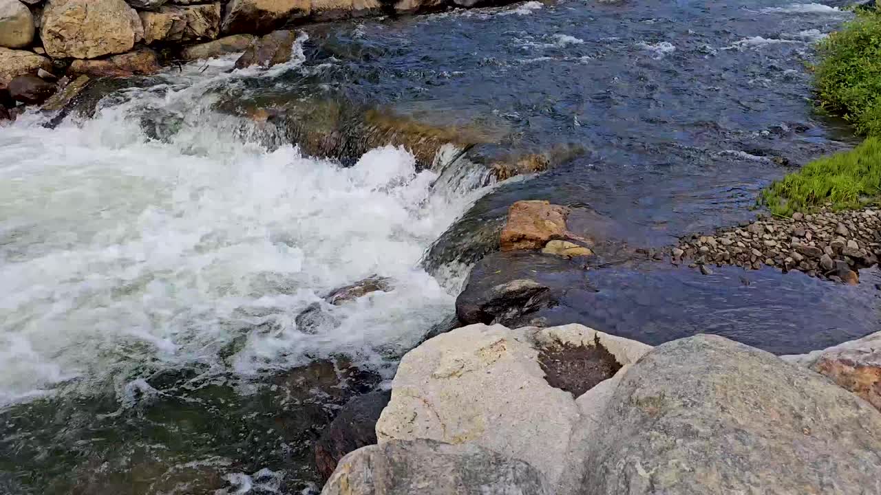 Handheld video of a stream or small river in Breckenridge Colorado, This was shot in July 2024.