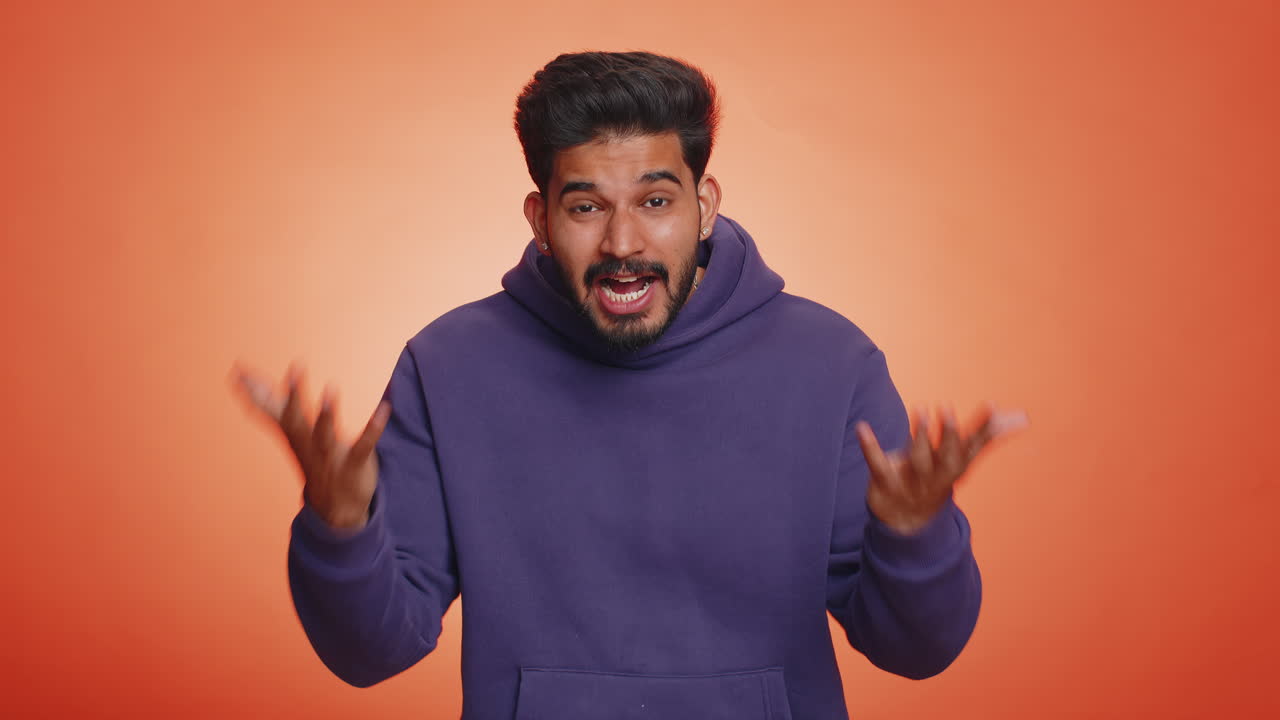 Man raising hands in indignant expression ask why what reason of failure demonstrating disbelief