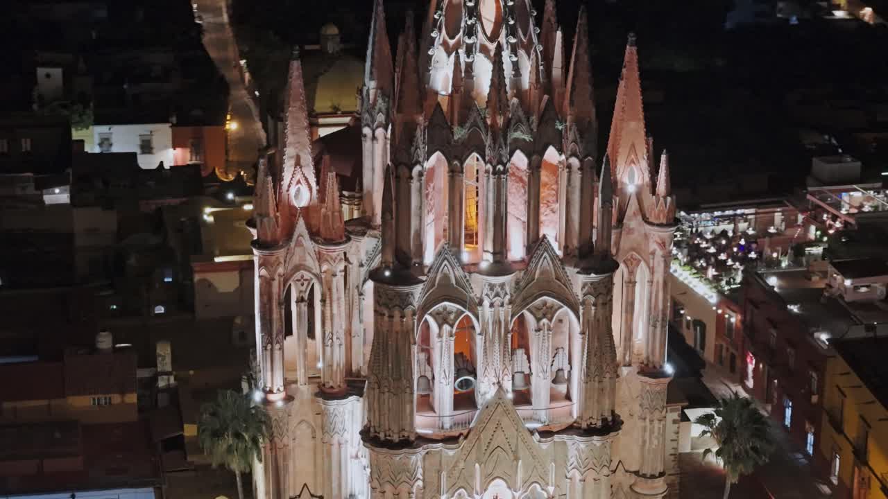 Colorful architecture and lively atmosphere in San Miguel de Allende during a warm evening