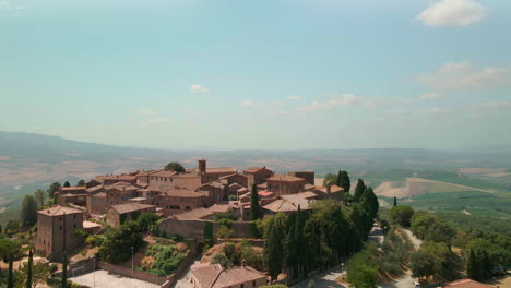 Old-Town-On-Hilltop-Revealed-Countryside-Farmland-At-Sant'Angelo-In-Colle,-Montalcino-Siena,-Tuscany-Italy