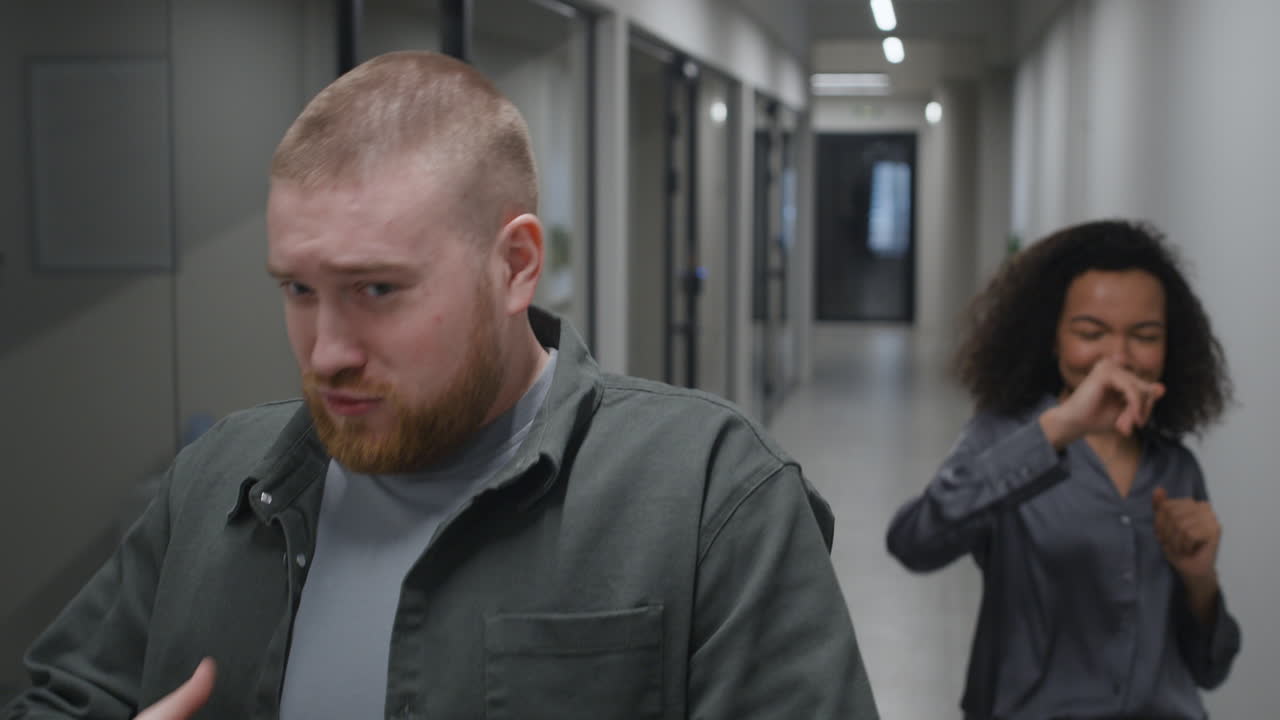 People Dancing in Hallway