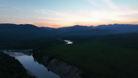 stunning sunrise over north fork flathead river in montana, usa