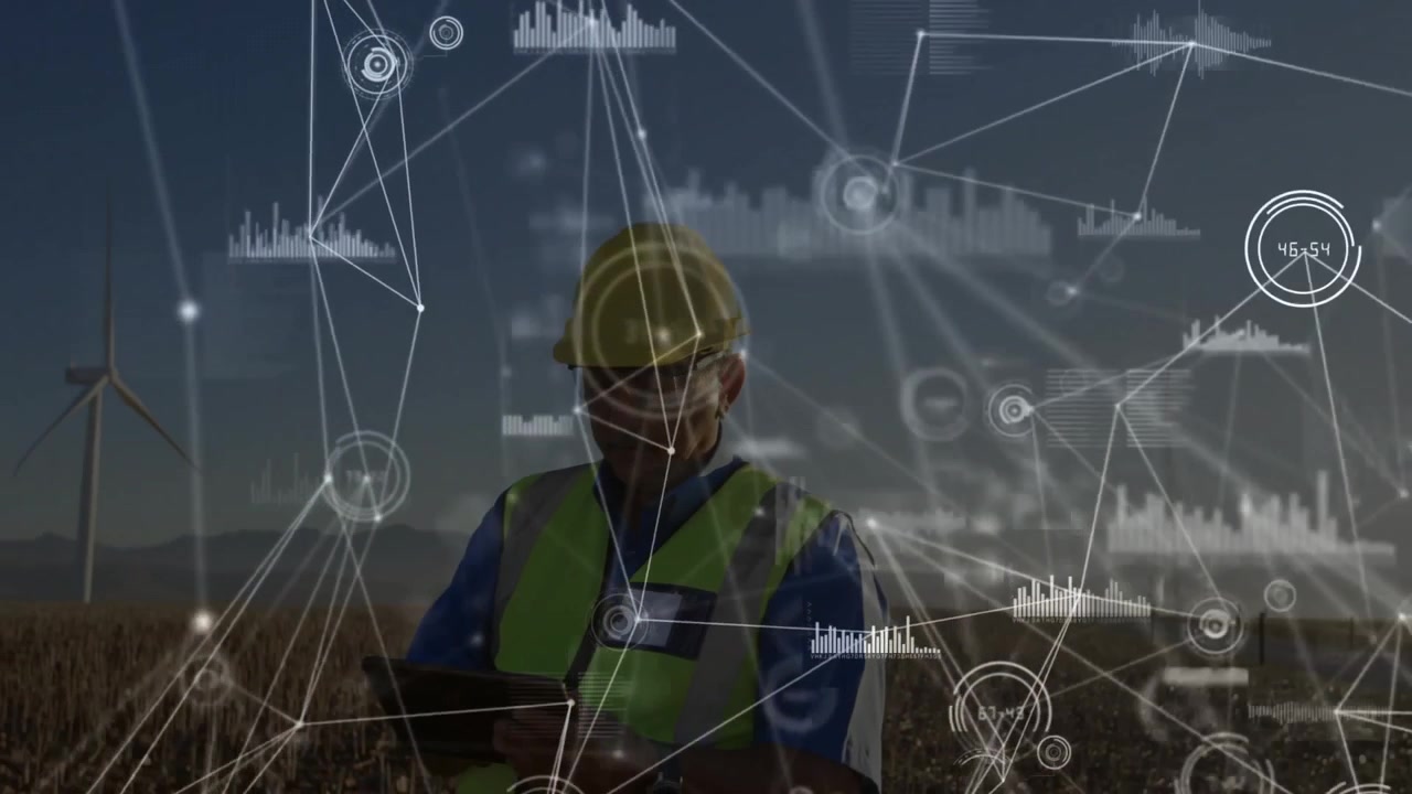 Engineer Using Tablet at Wind Farm with Digital Data Overlay