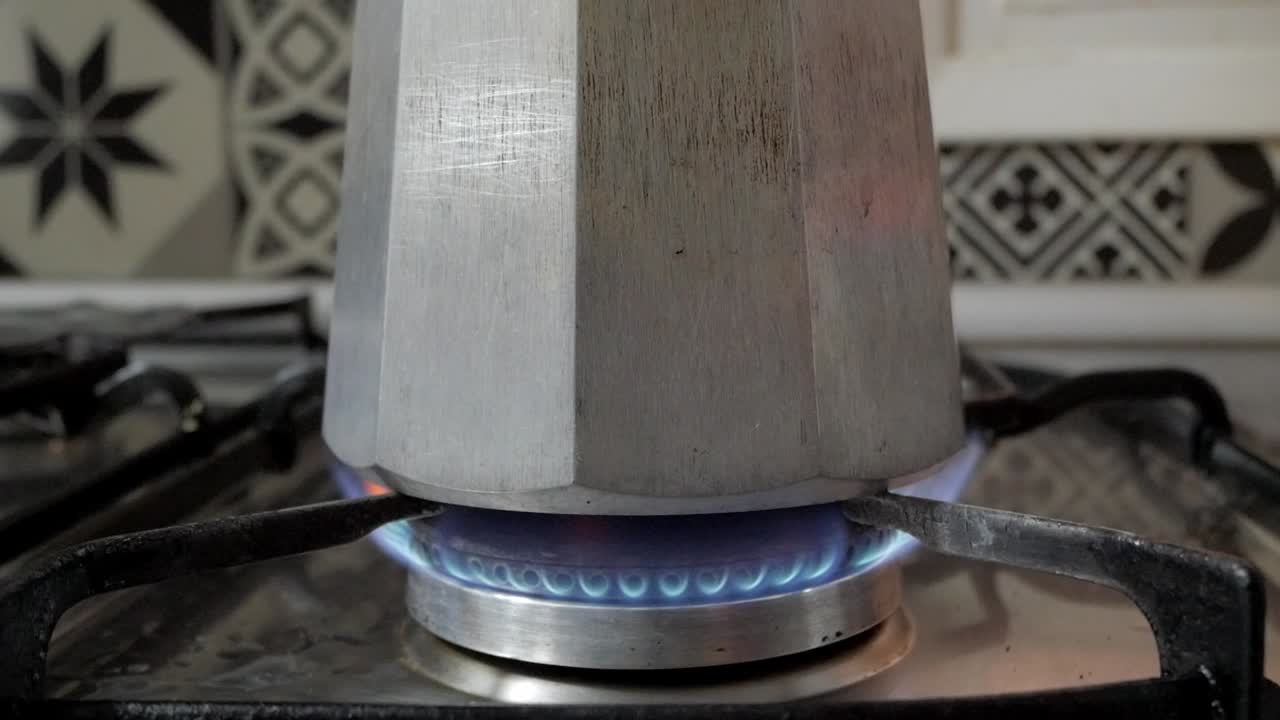 Super close-up of moka pot for coffee on the stove. Daily life