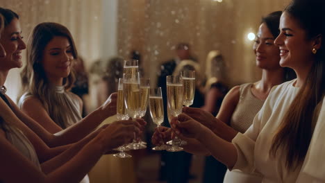 women celebrating with champagne