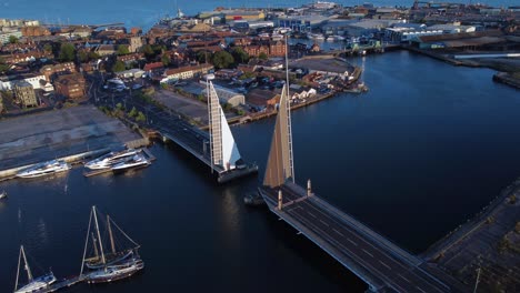 twin sails bridge fully open waiting for a boat to sail through