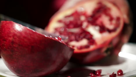 cutting the pomegranate