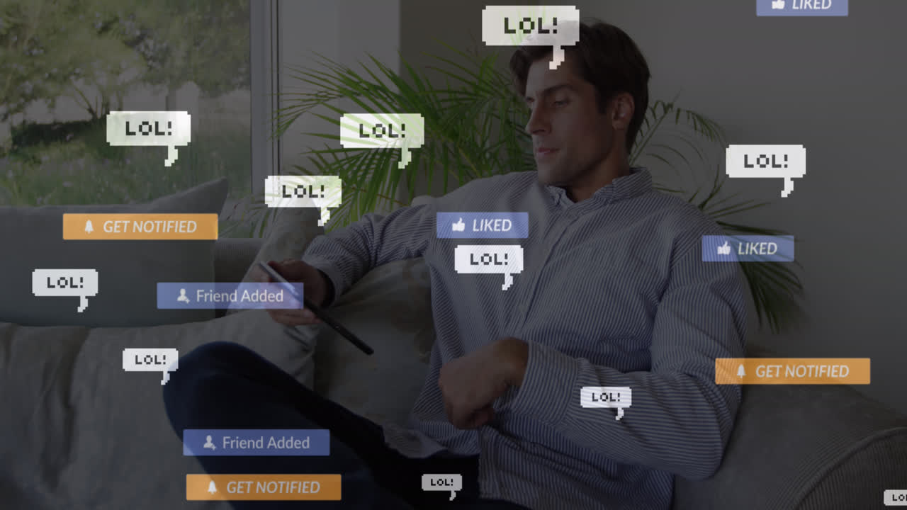 animación de iconos de redes sociales sobre hombre caucásico usando tableta digital sentado en el sofá en casa