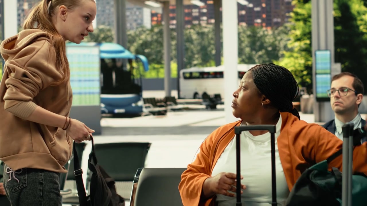 Heated confrontation between two women at busy intercity bus stop