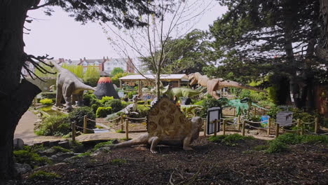 family enjoying a day out visiting a dinosaur theme park in lincolnshire england