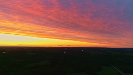 aerial view during colorful golden hour sunset with clouds