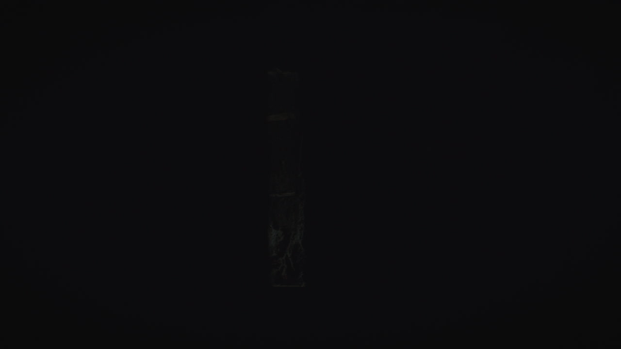 Gimbal reveal shot of bunker window at coastal battery