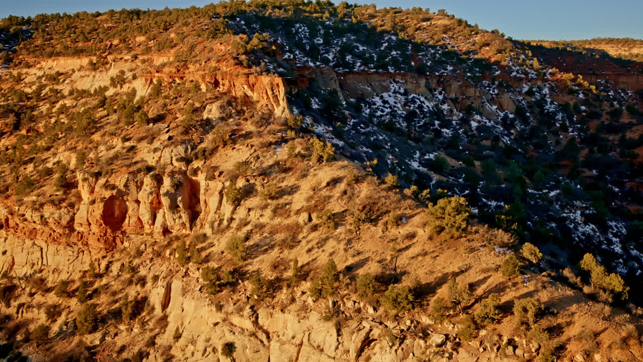 Aerial perspective of a magnificent sandstone arch in the early morning light near Kanab, Utah.