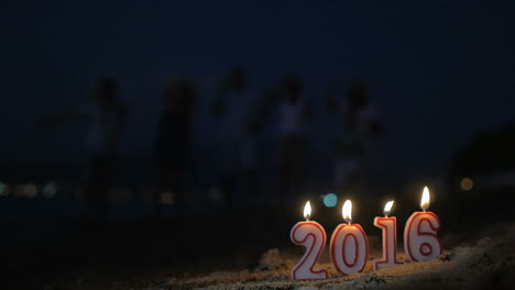 lit candles as symbol of new year 2016