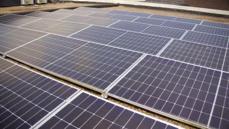 slow revealing video of a solar panel array filmed on a bright and sunny day. produced in 4k, 30fps and with rec709 color