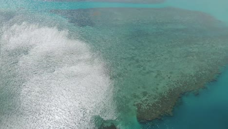 Sunlight-reflecting-over-ocean-water-surface-of-Whitsundays-islands-at-Shute-Harbour-in-Australia