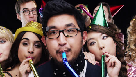 Multi-ethnic-group-of-people-celebrating-birthday-party-slow-motion-photo-booth