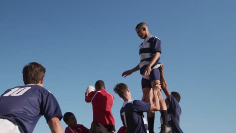 rugby players having match on the field