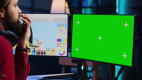 freelancer browsing images on mockup pc in media agency