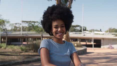 Front-view-of-mixed-race-woman-in-park