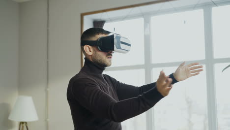 man using vr headset in a modern home