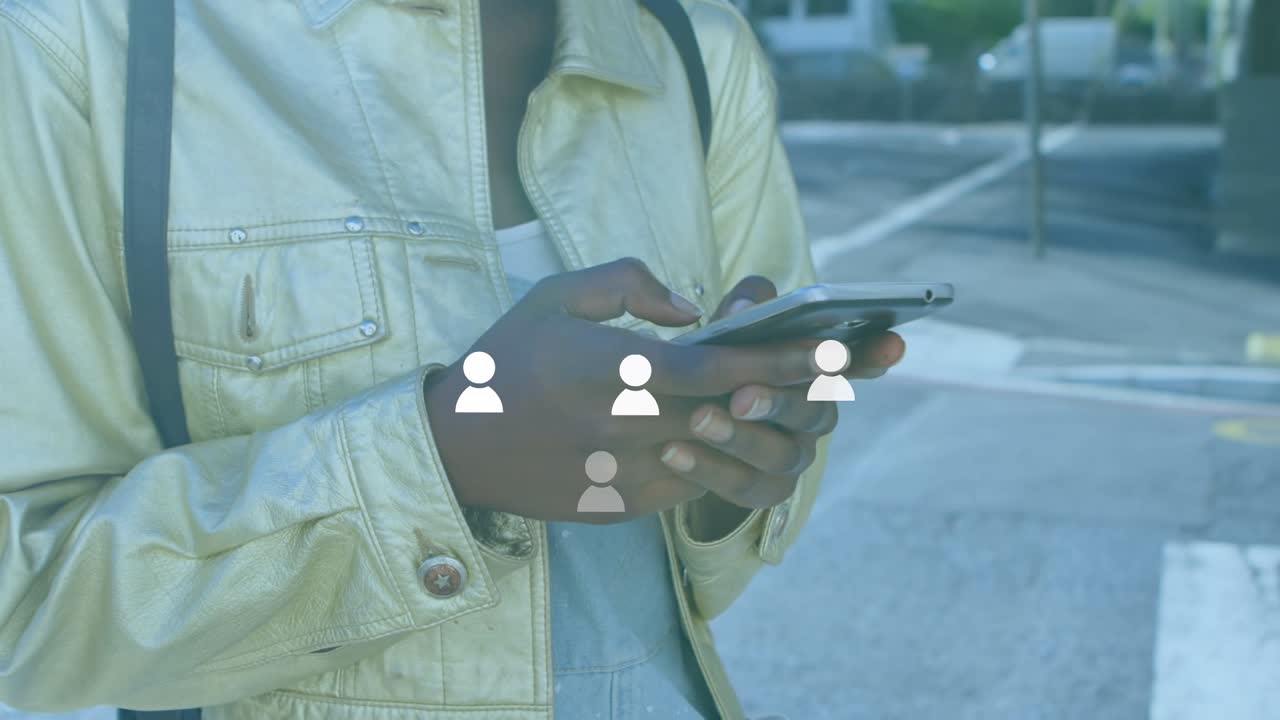 Animation of earth day and social media icons over hands of african american woman using smartphone