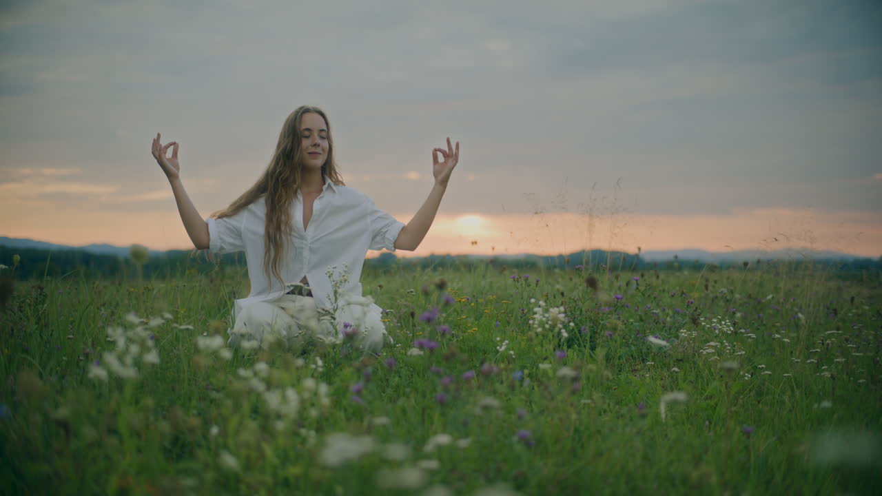 Woman Meditation On A Meadow