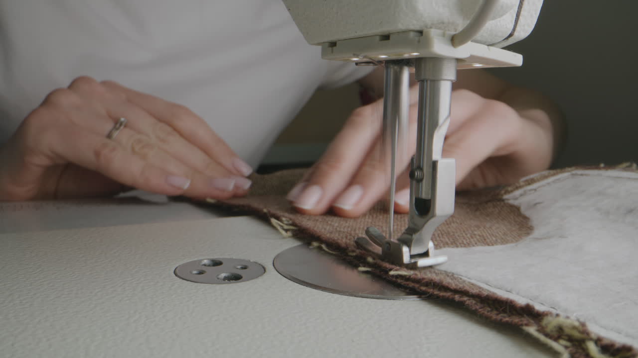 Woman sewing on a sewing machine