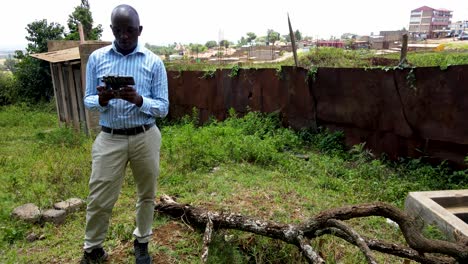 An-African-drone-pilot-flying-drone-in-rural-Africa