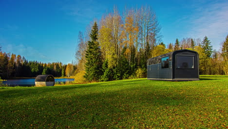 moody to bright day in rural landscape with sauna sheds, fusion time lapse