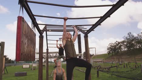 Young adults training at an outdoor gym bootcamp