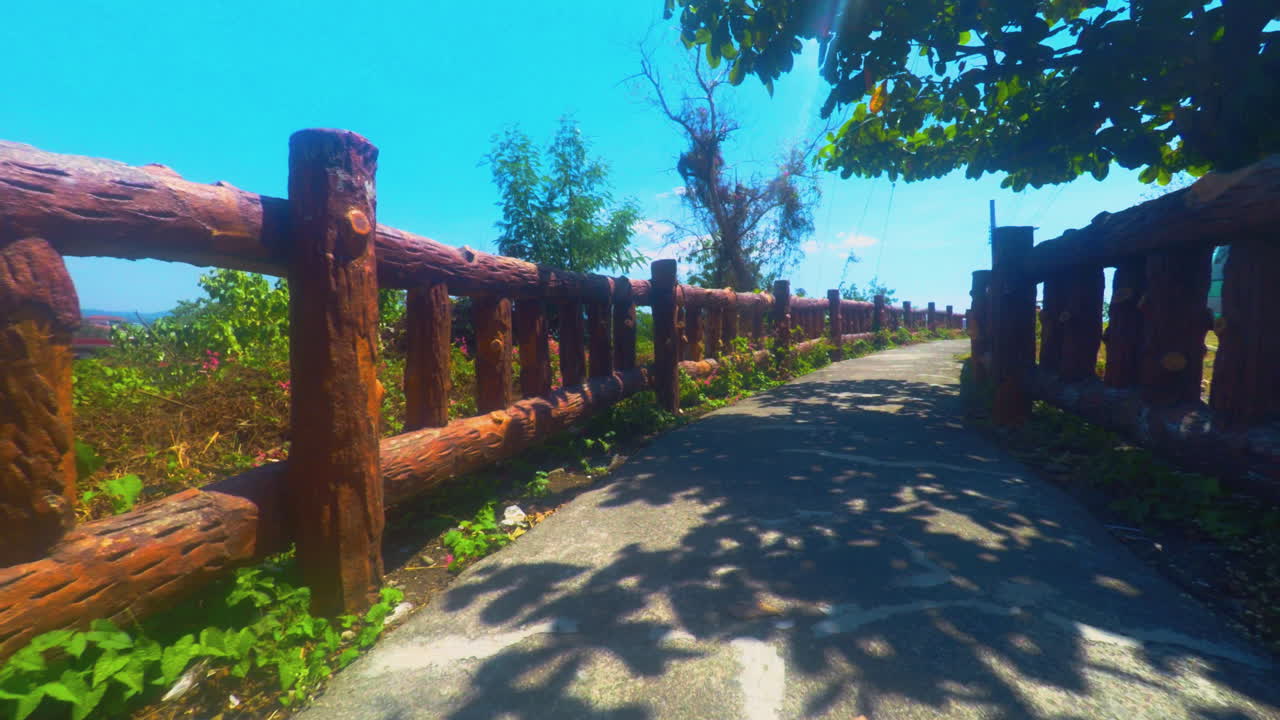 Relaxing View of a Pathway With Fence and Blue Sky in the Background, Olongapo City, Philippines