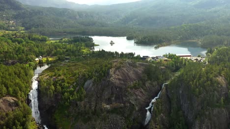 Latefossen-is-one-of-the-most-visited-waterfalls-in-Norway-and-is-located-near-Skare-and-Odda-in-the-region-Hordaland,-Norway.-Consists-of-two-separate-streams-flowing-down-from-the-lake-Lotevatnet.