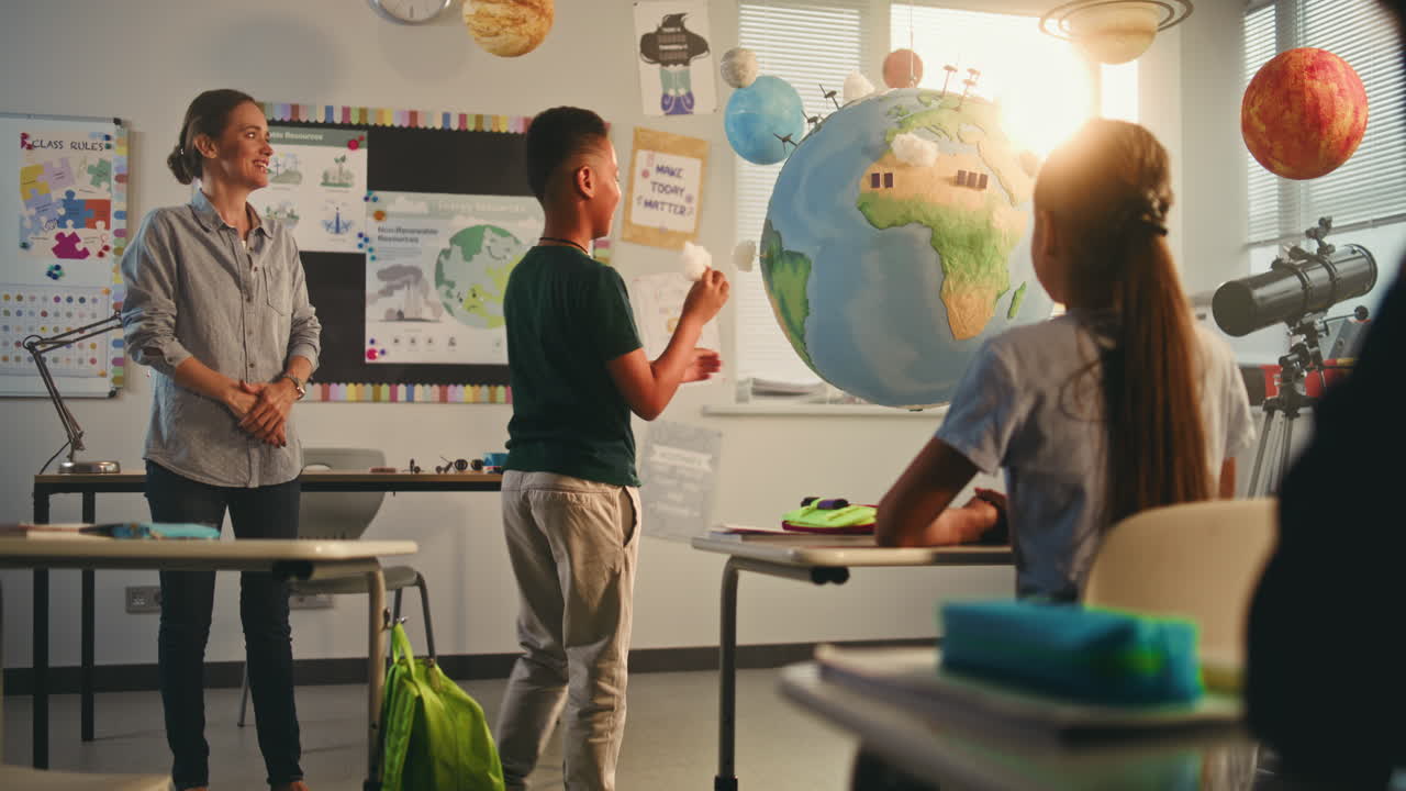 STEM Class Shy Elementary School Boy Presenting Homework on Ecology in Front of Classmates