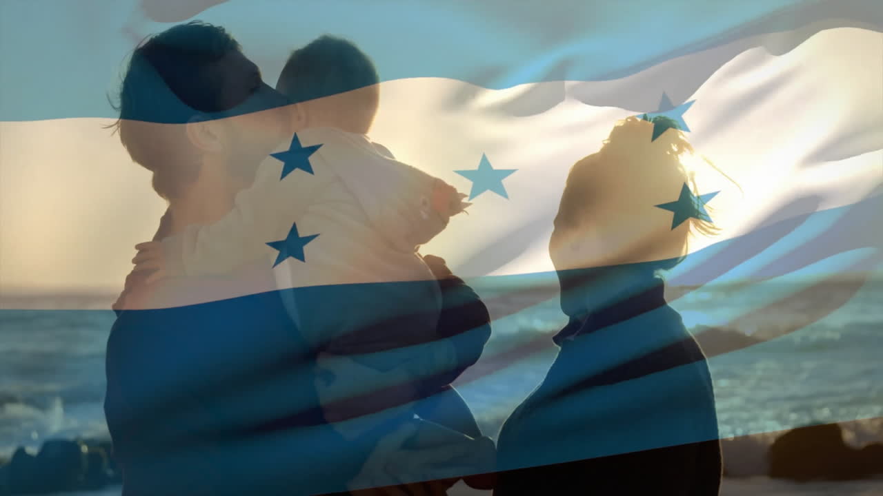 Family at beach with Honduras flag overlay, creating animation silhouette effect