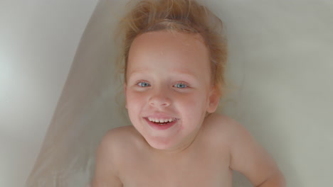 happy kid enjoying the bath