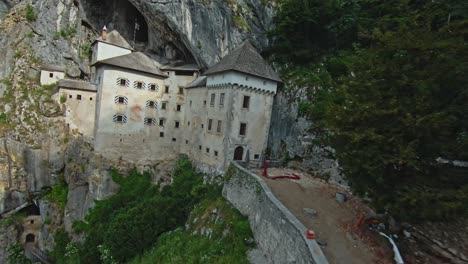 path to the predjama castle within the mountain cave mouth in inner carniola, slovenia