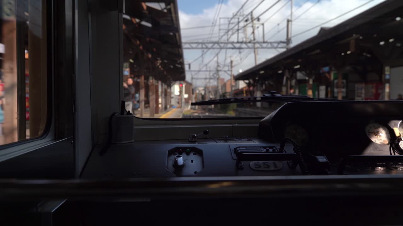 View Of Structures Along The Enoshima Dentetsu Railway In Japan From The Train's Cabin - Wide Shot