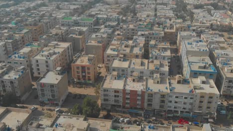 aerial view of rooftop residential apartments in clifton cantonment in karachi, pakistan. tracking shot