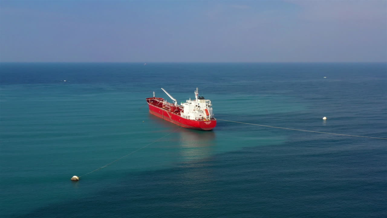Oil Chemical Tanker Tied with strings Close to port Aerial Footage