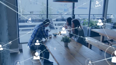 animation of network of connections with people icons over diverse business people in office