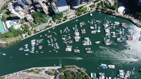 Aberdeen-harbour-and-skyline-in-southwest-Hong-Kong-island-on-a-beautiful-day,-Aerial-view