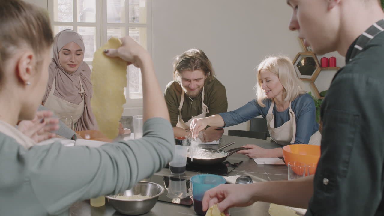 People cooking together in a kitchen