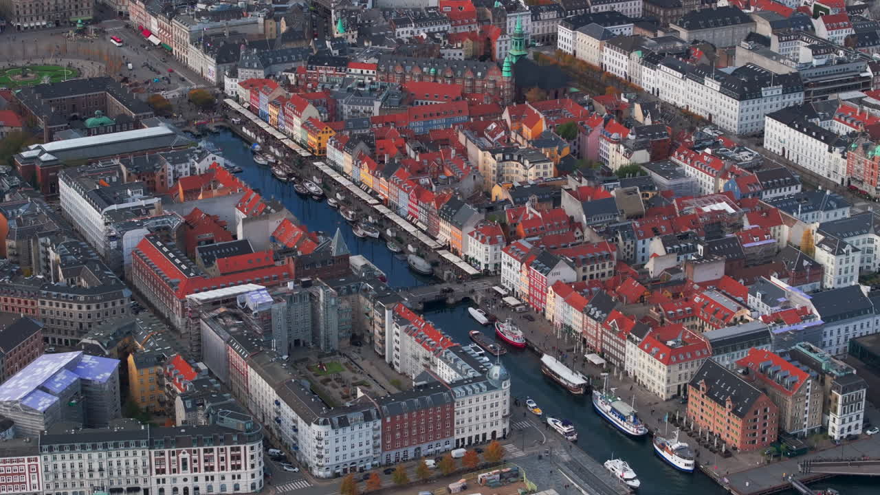Tight aerial shot over colourful houses Nyhavn Copenhagen Denmark