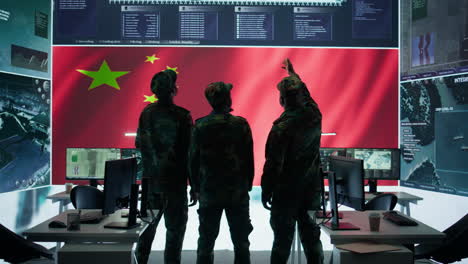 Cybersecurity-specialist-in-Chinese-military-command-post-analyzes-data-to-inflict-fear