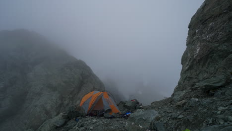 timelapse tent in the mountains cold and cloudy