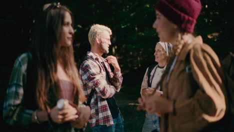 Friends-Talking-To-Each-Other-While-Taking-Break-At-Vacation